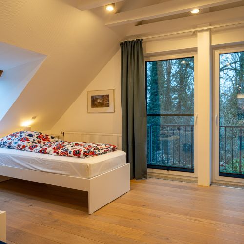 ferienwohnung1-waldblick-tannriede-schlafzimmer-3